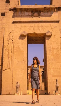 a young tourist leaving the edfu temple near the n 2026 04 14 05 33 39 utc